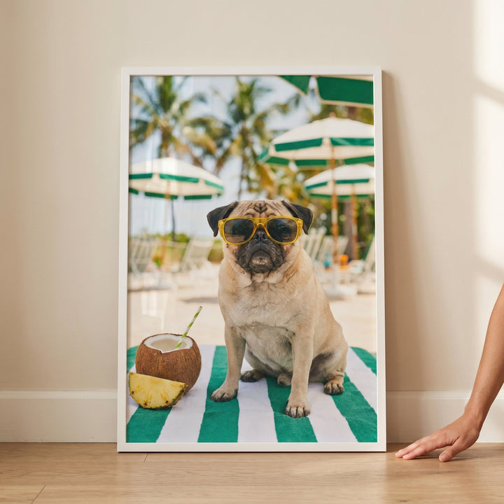 Framed yellow shades beach pug wall art features a pug in sunglasses on a towel with a coconut drink and pineapple.