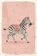 A whimsical illustration of a zebra wearing a red gingham cloth on its back and holding a pink flower in its mouth while walking against a soft pink background with scattered stars.

