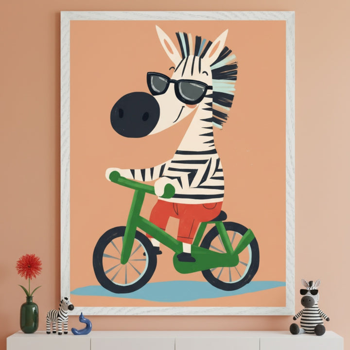 Kid's room with a white dresser. A large framed print of a cartoon zebra in sunglasses riding a green bicycle on a peach background hangs above the dresser. A red flower in a green vase, a small zebra figurine, a blue figurine, and a plush zebra toy are on the dresser.
