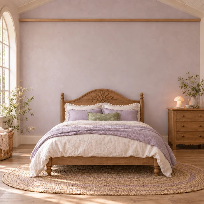 Kids' room with three fairy prints above the bed